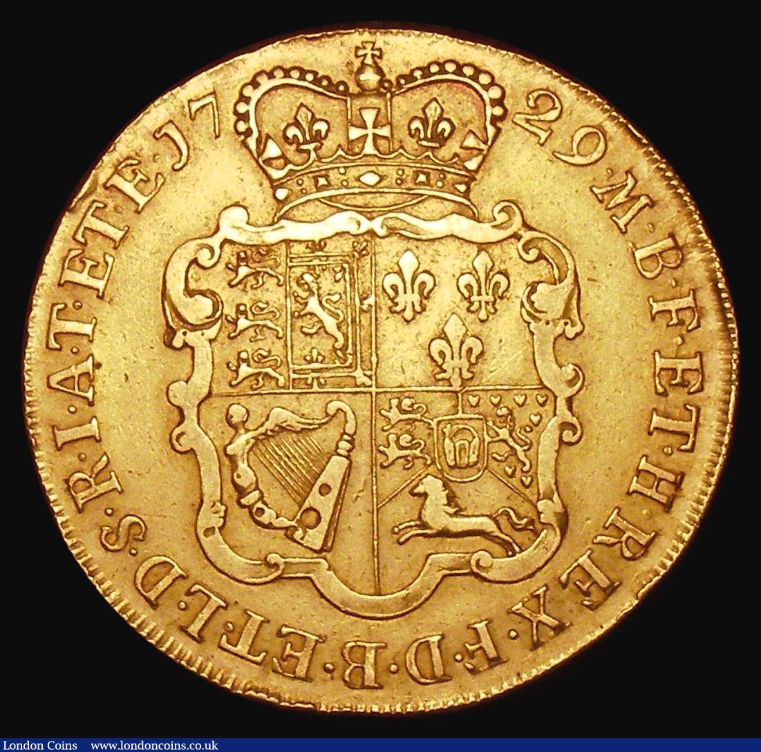 London Coins : A155 : Lot 859 : Five Guineas 1729 Plain below bust S.3663, our archive database show this to be scarcer than the 172...