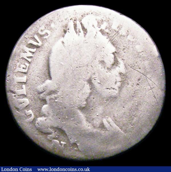 Sixpence 1697N First Bust GVLIEMVS error ESC 1561A only Fair/Poor but the error very clear, ESC rates at R5, excessively rare, our archive database going back to 2003 shows that this is the first example we have offered : English Coins : Auction 156 : Lot 3545
