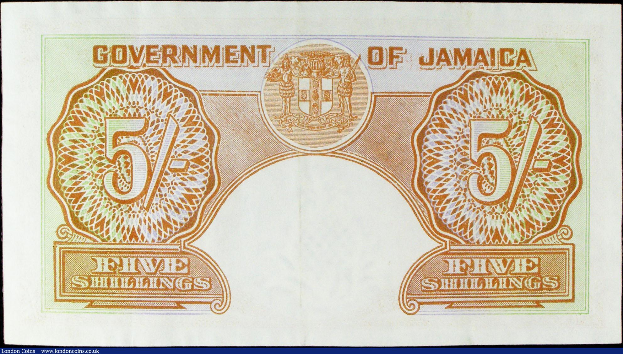 London Coins : A156 : Lot 220 : Jamaica 5 shillings dated 27th May 1957 series 98D 77637, KGVI at left, Pick37b, GVF