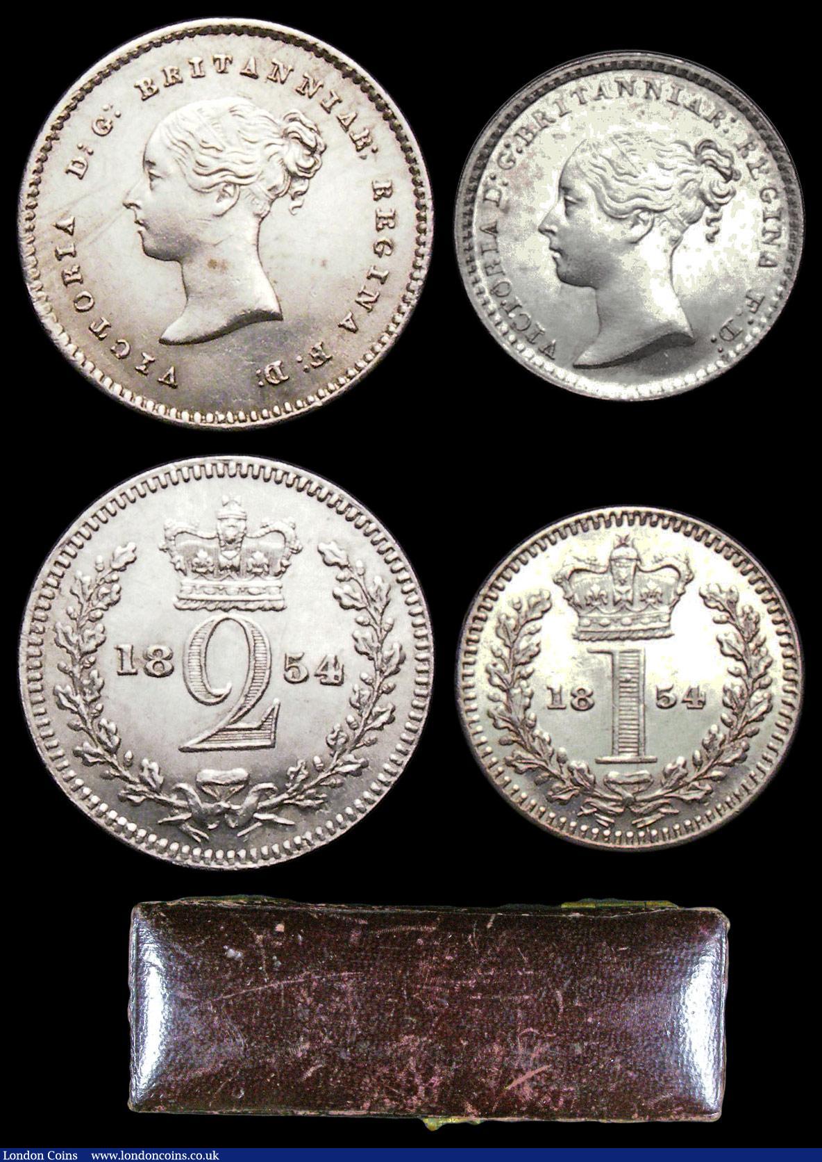 London Coins : A156 : Lot 2412 : Maundy Set 1854 ESC 2465 GEF to UNC and lustrous, the Threepence with some contact marks, the Penny ...