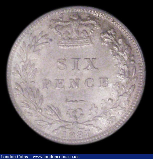 London Coins : A156 : Lot 2806 : Sixpence 1887 Young Head ESC 1750 Choice UNC and lustrous with a hint of colourful tone, slabbed and...