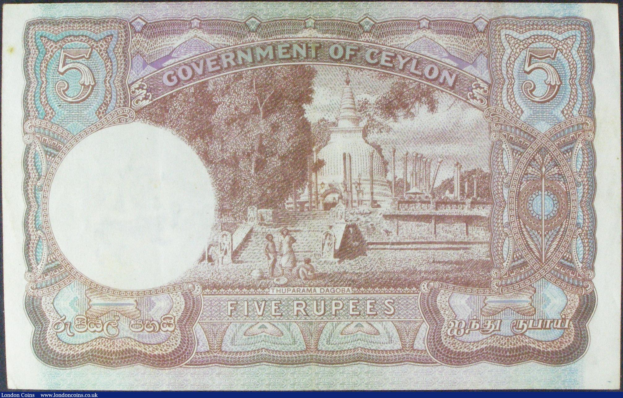 London Coins : A157 : Lot 121 : Ceylon 5 rupees dated 4th August 1943 series G/14 818032, KGVI portrait, Pick36a, tiny foxing spot, ...