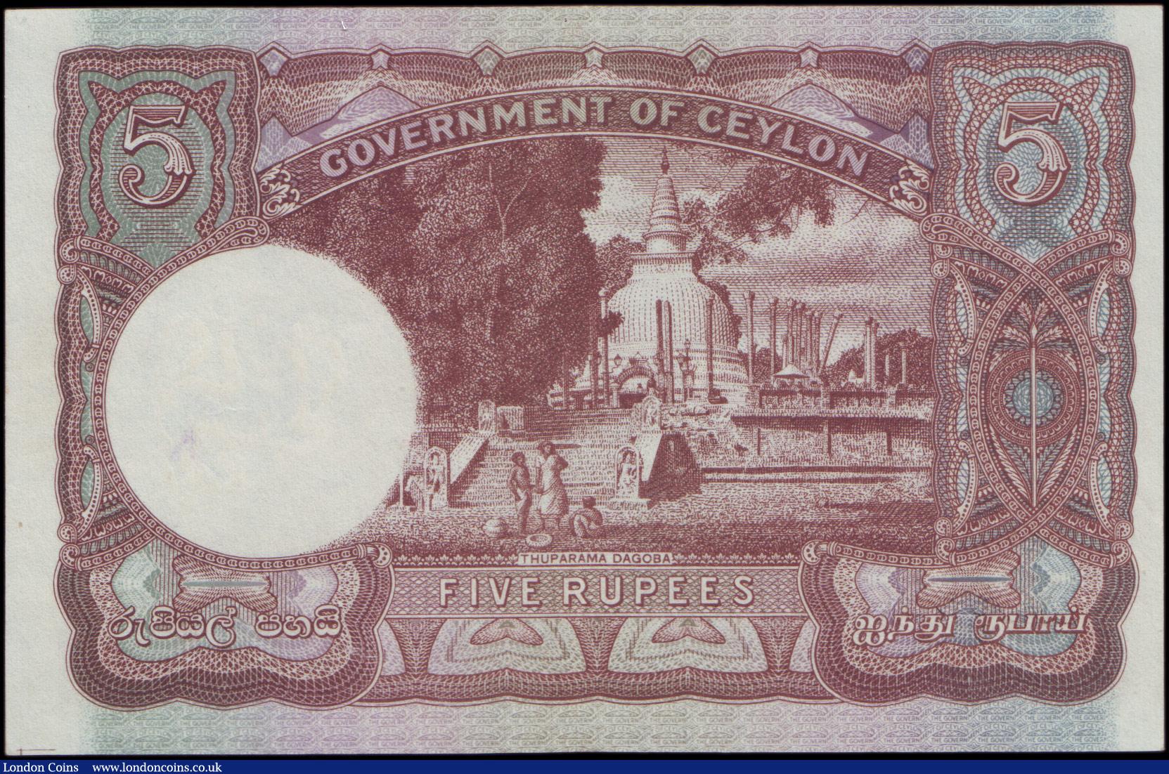London Coins : A157 : Lot 122 : Ceylon Government 5 Rupees Pick36, dated 12th July 1944 series G/21 689084, portrait KGVI on left, P...