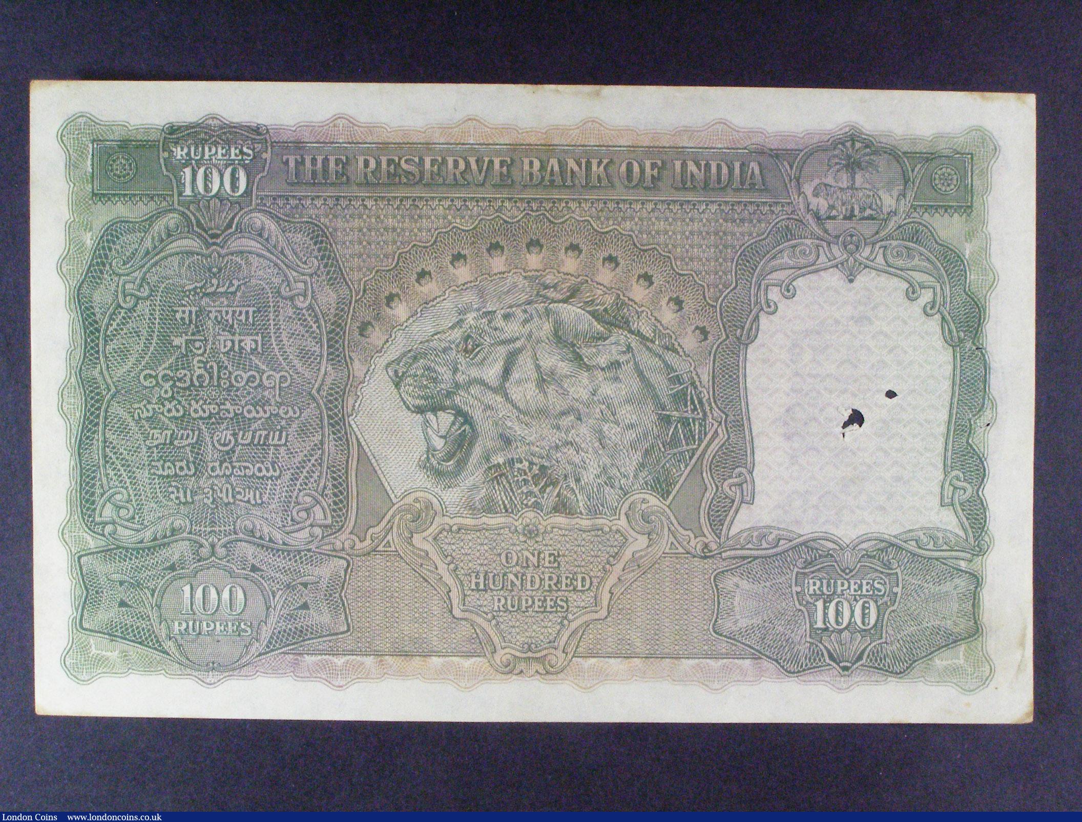 London Coins : A157 : Lot 164 : India 100 rupees KGVI issued 1943 series A/88 218203, Calcutta branch, signed Deshmukh, Pick20e, sta...