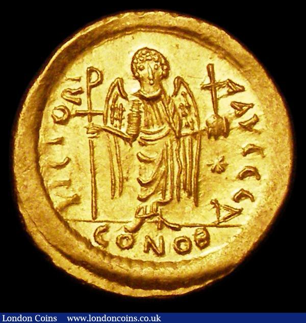 Justinian I.  Au solidus.  C, 527-565 AD.  Rev;  VICTORIA AVGGG Δ; Victory standing, holding long cross; star in right field, CONOB in ex.  SB 140.  4.48g.  GVF : Ancient Coins : Auction 157 : Lot 1768