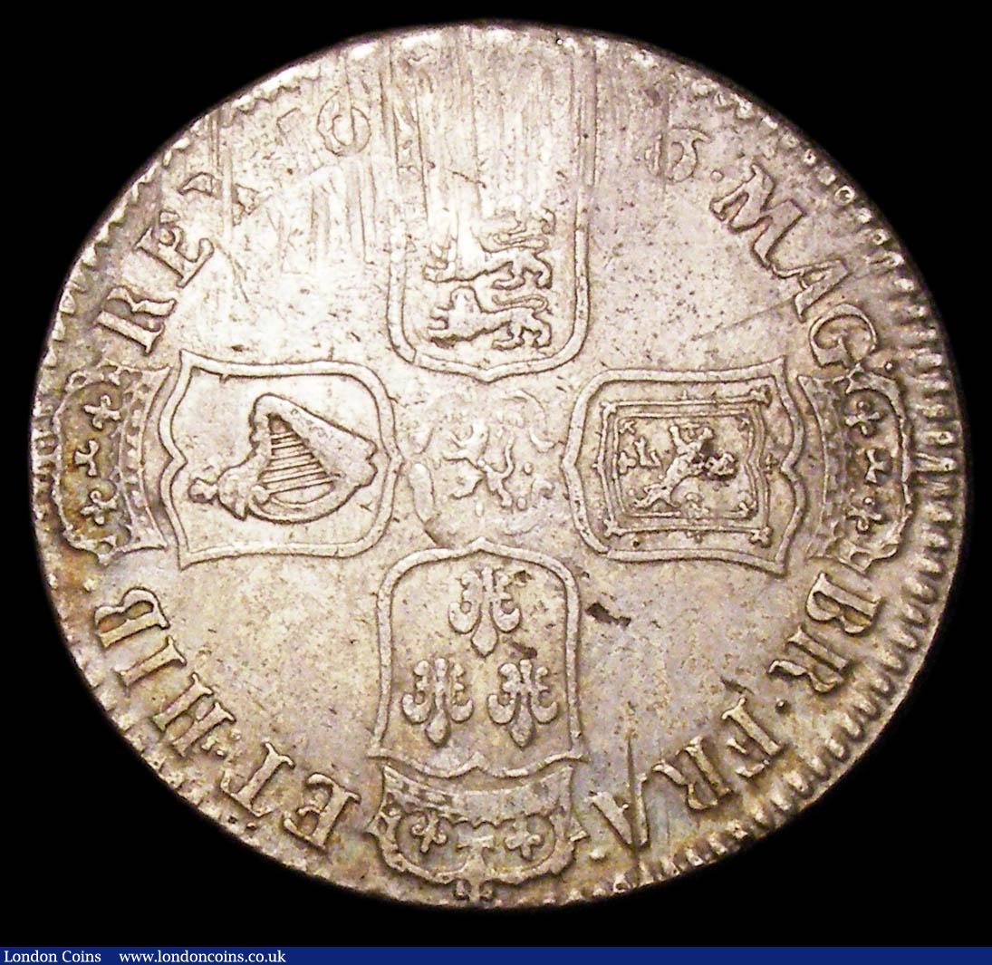 London Coins : A157 : Lot 2394 : Halfcrown 1696 First Bust, Large Shields Early Harp, OCTAVO edge ESC 522 VF with some heavier adjust...