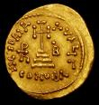 London Coins : A157 : Lot 1754 : Heraclius.  Au solidus.  C, 638-639 AD.  Constantinople.  Obv; Crowned figures of Heraclius, in cent...