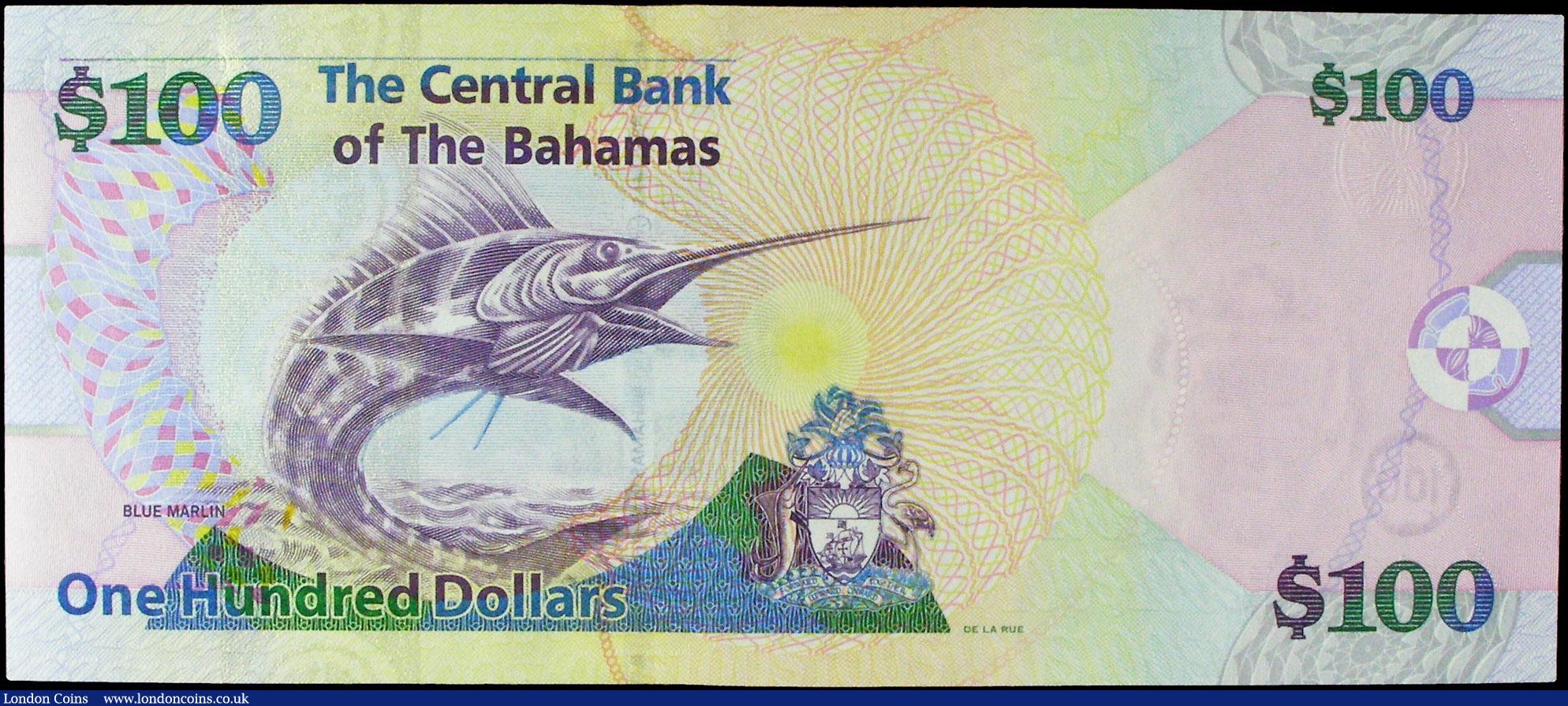 London Coins : A158 : Lot 145 : Bahamas Central Bank 100 Dollars issued 2009 series C171841, Pick76a, portrait QEII at right, signed...