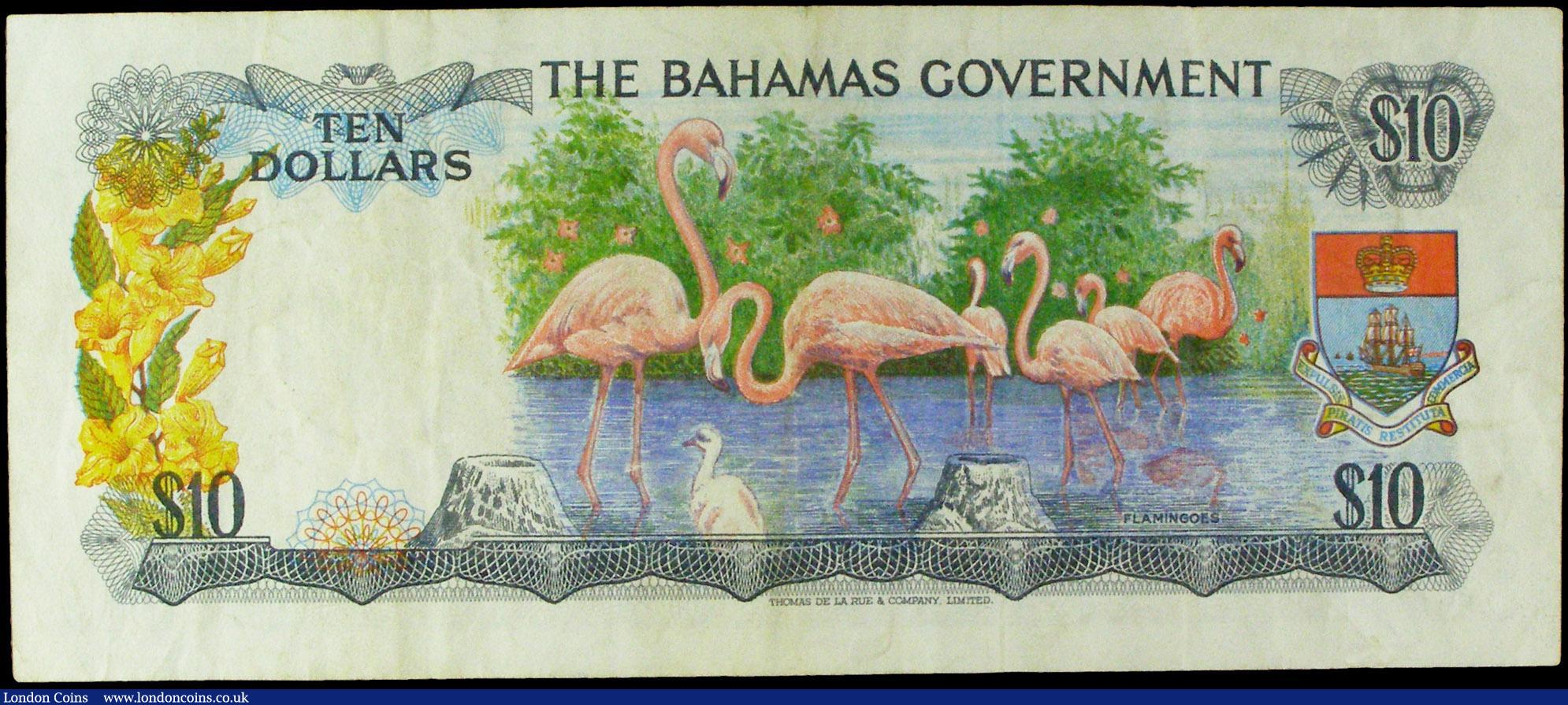 London Coins : A158 : Lot 147 : Bahamas Government 10 Dollars issued 1965 first prefix series A452908, Pick22a, portrait QEII at lef...