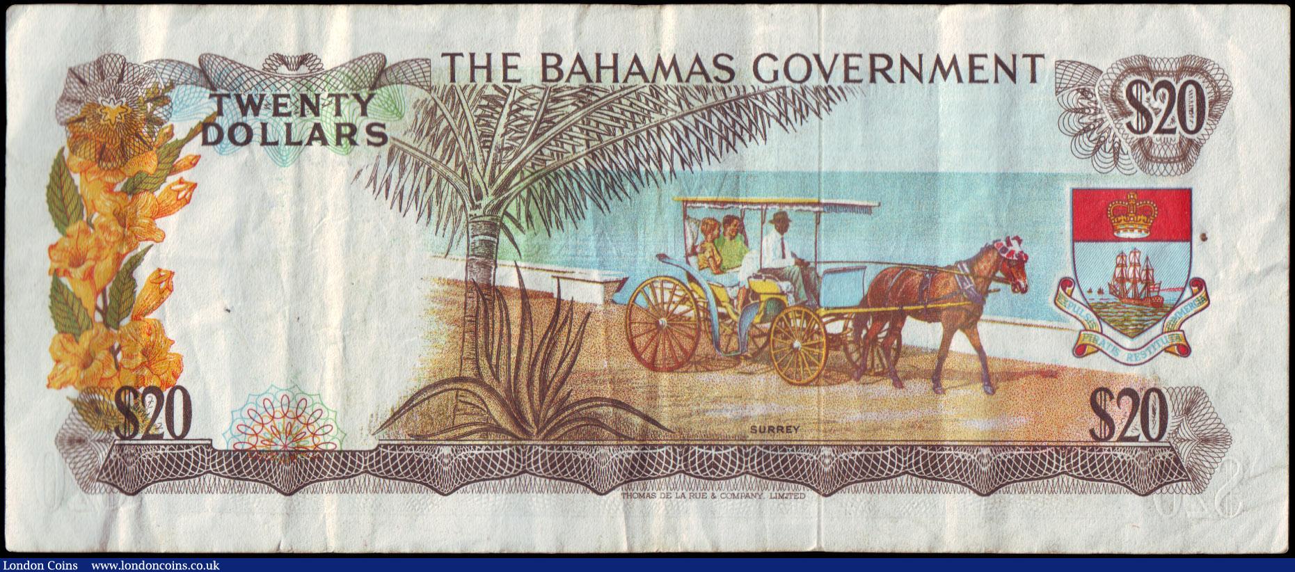 London Coins : A158 : Lot 148 : Bahamas Government 20 Dollars issued 1965 first prefix series A472090, Pick23a, portrait QEII at lef...
