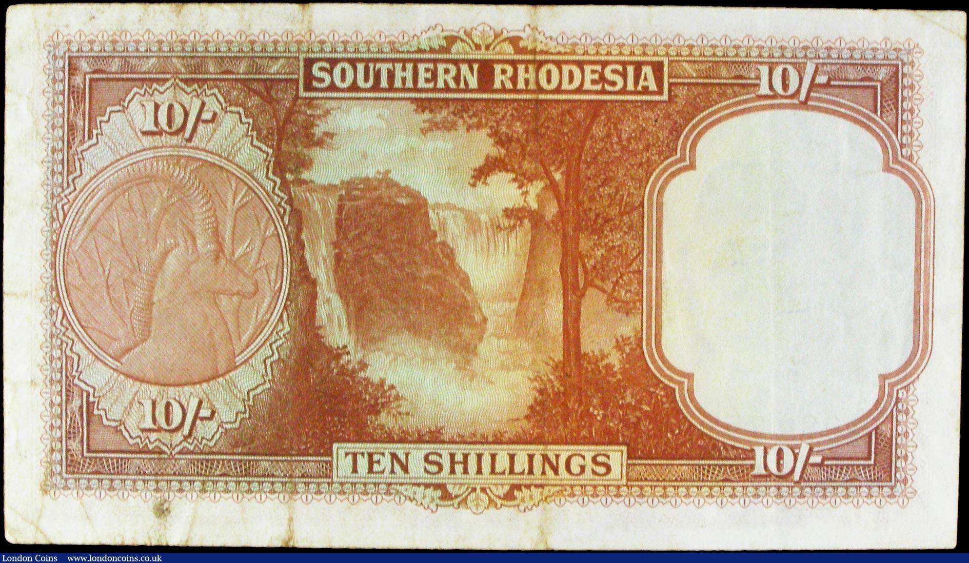 London Coins : A158 : Lot 489 : Southern Rhodesia 10 Shillings dated 1st February 1945 series A/39 080758, Pick9b, portrait KGVI at ...