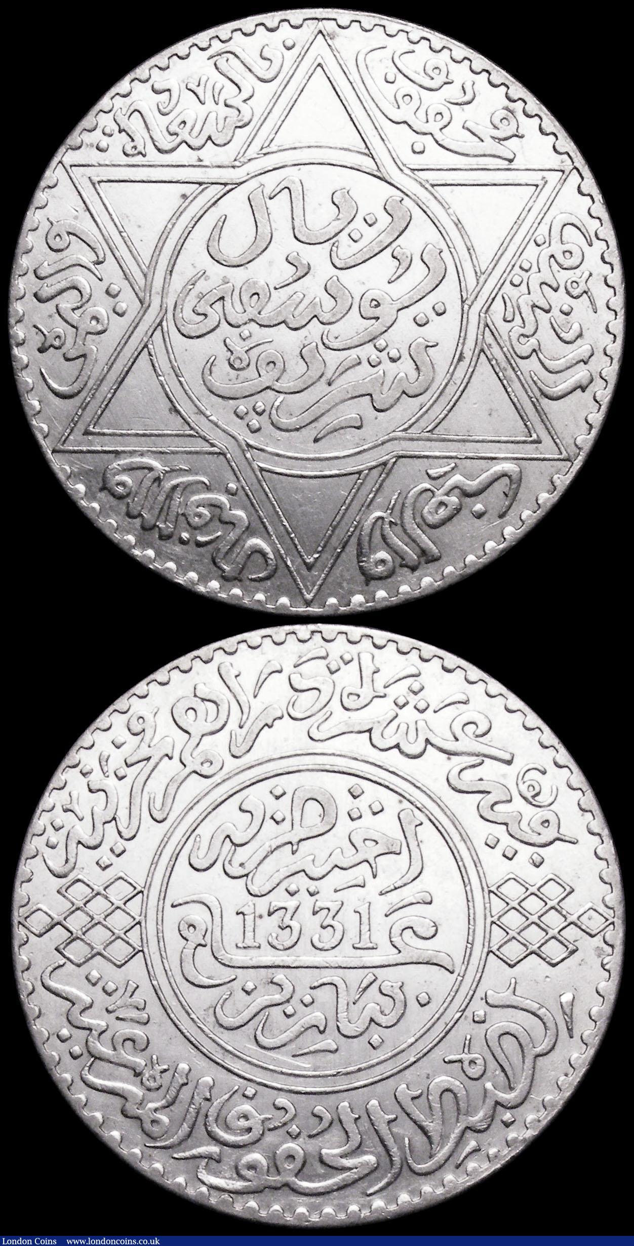 London Coins : A160 : Lot 3371 : Morocco Rial (10 Dirhams) (2) AH1299 (1881) Paris Mint Y#8 GVF, AH1331 (1912) Y#33 EF and lustrous
