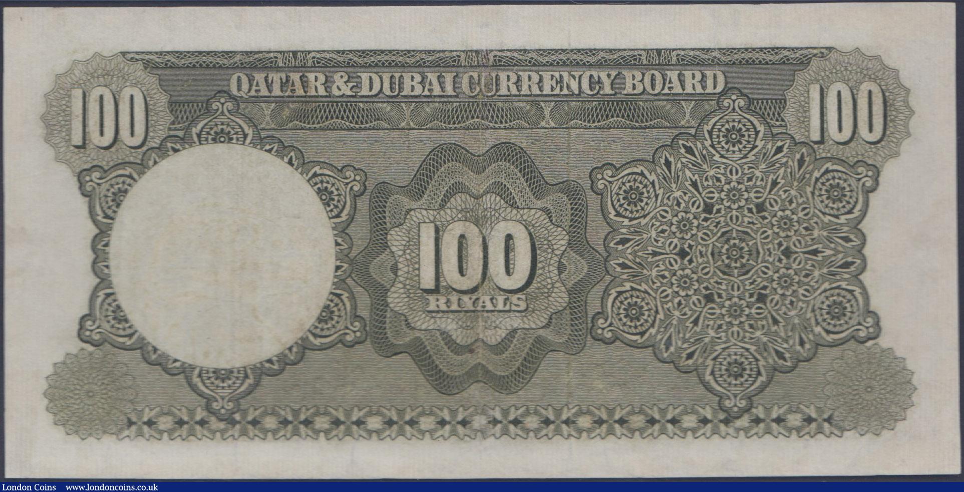 London Coins : A160 : Lot 493 : Qatar & Dubai 100 Riyals issued 1960's, series A/1 950794, (Pick6a), in PMG holder graded 3...