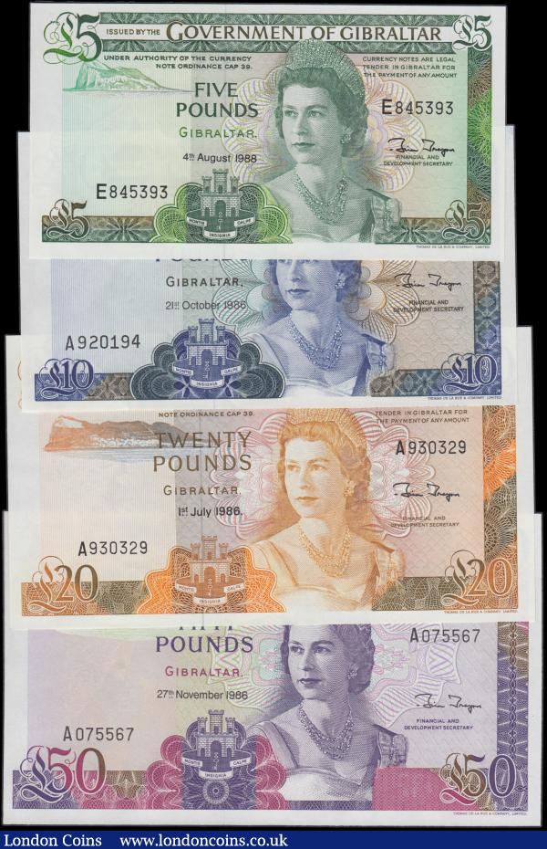 Gibraltar (4), 50 Pounds dated 27th November 1986 series A075567, (Pick24) Uncirculated, 20 Pounds dated 1st July 1986 series A930329, (Pick23c) good EF, 10 Pounds dated 21st October 1986 series A920194, (Pick22b) about Uncirculated, 5 Pounds dated 4th August 1988 series E845393, (Pick21b) Uncirculated : World Banknotes : Auction 162 : Lot 256