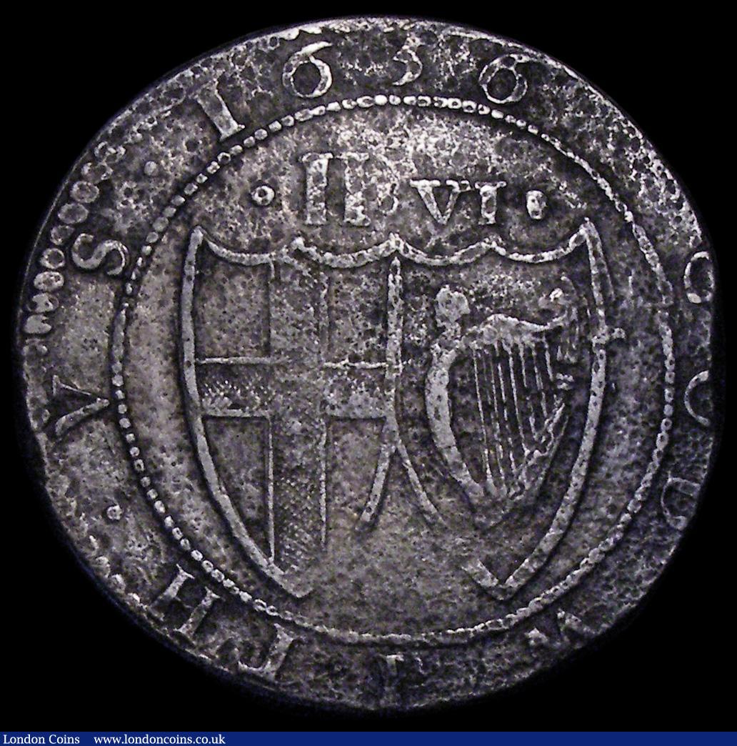 London Coins : A162 : Lot 1600 : Halfcrown 1656 Commonwealth ESC 437, Bull 49 Fine, struck on a porous flan, the reverse with a spot ...
