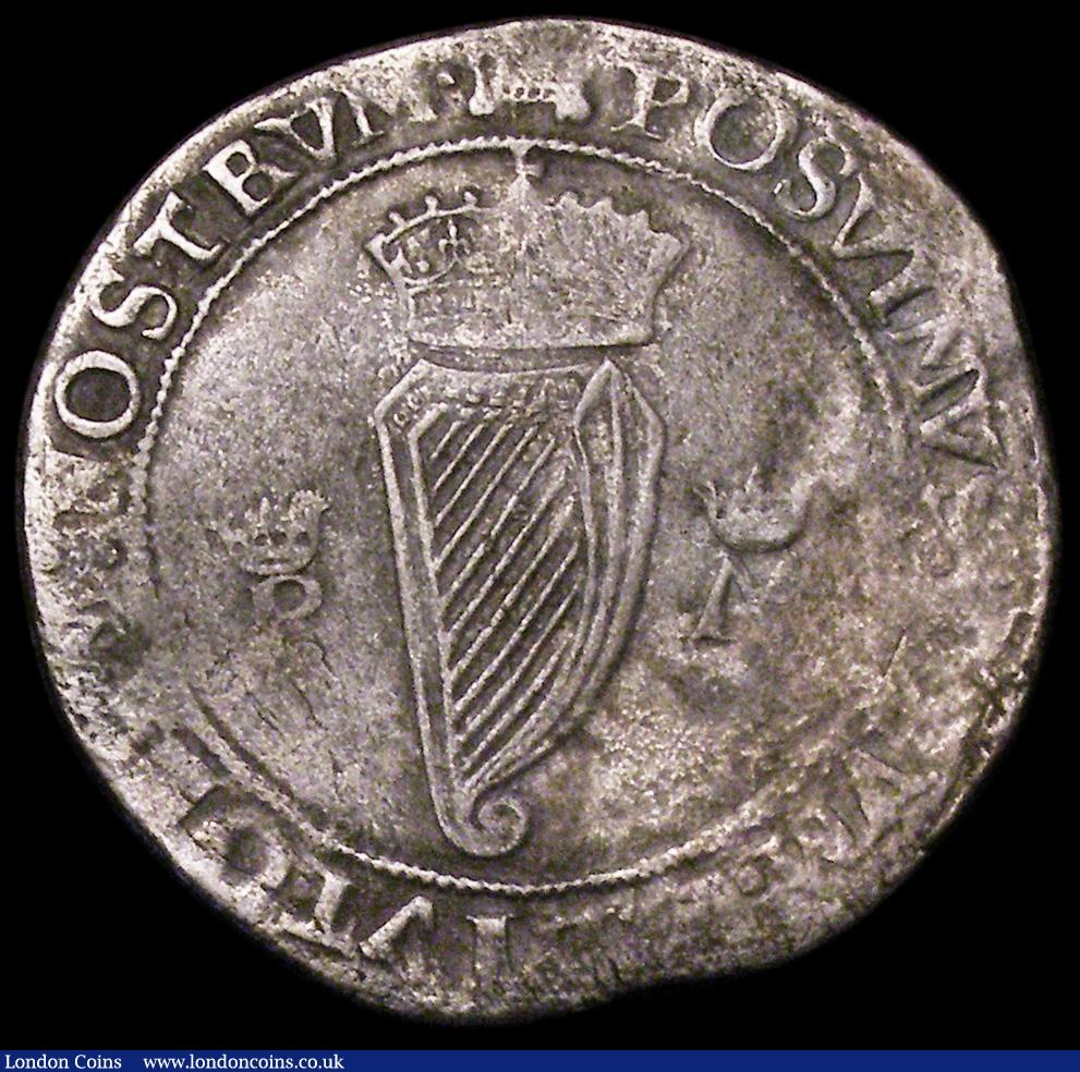 London Coins : A162 : Lot 1671 : Ireland Shilling Philip and Mary 1555 S.6500 mintmark Portcullis, approaching Fine for this base sil...