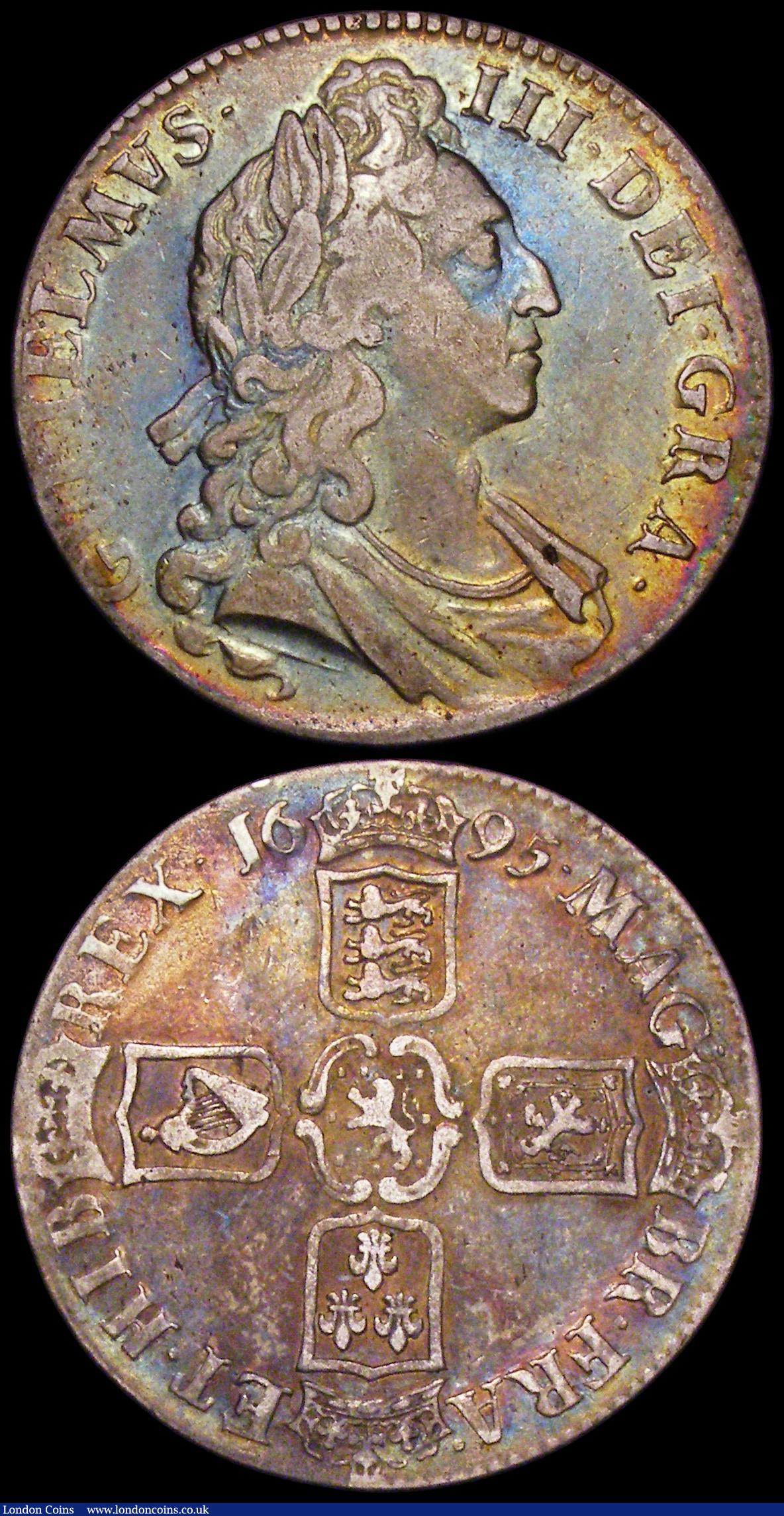 London Coins : A162 : Lot 1745 : Crowns (2) 1695 SEPTIMO, with cinquefoil stops on the edge ESC 86, Bull 990, Fine with an old and co...