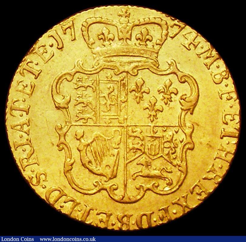 London Coins : A162 : Lot 1776 : Guinea 1774 S.3728 NVF/GF with a small scuff on the shield rim