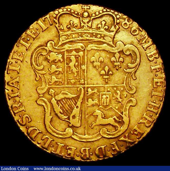 London Coins : A162 : Lot 1808 : Half Guinea 1786 S.3734 Good Fine with a small crease to the flan to the left of the crown