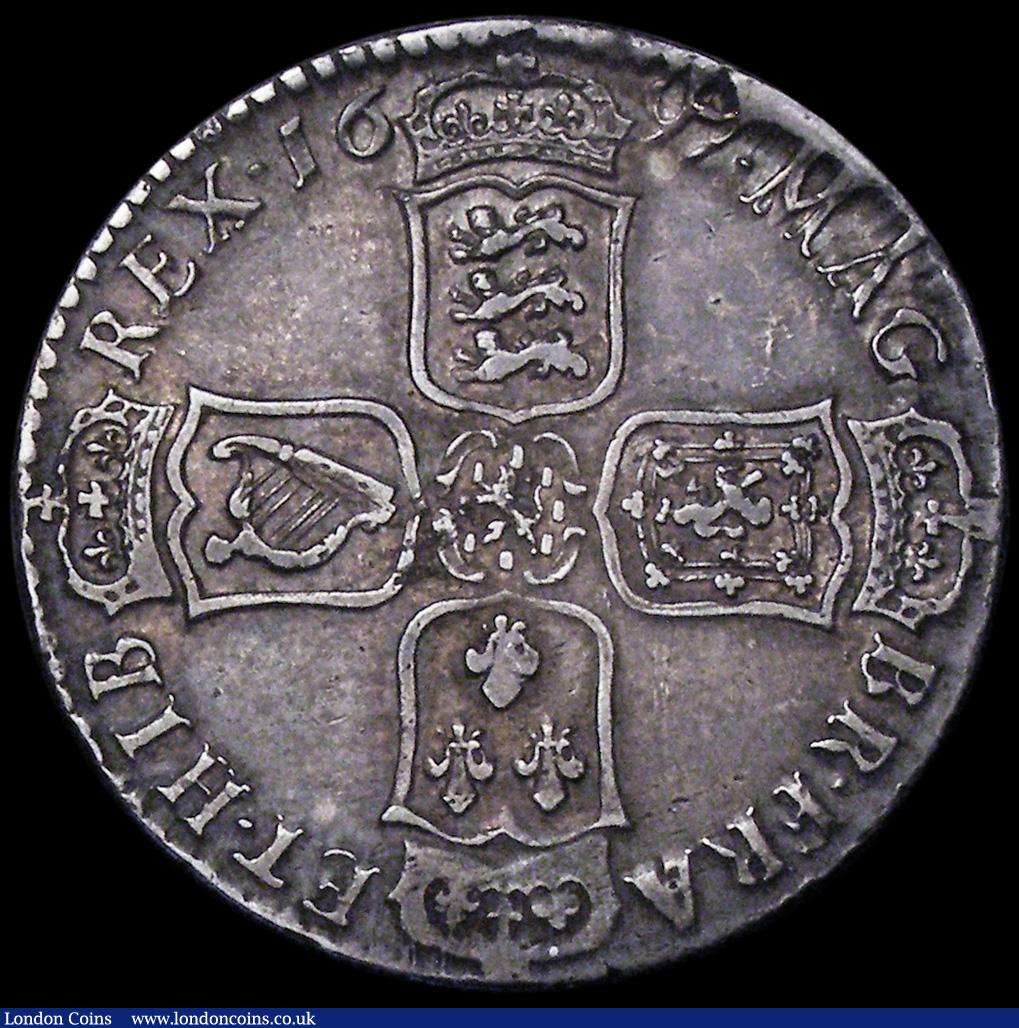 London Coins : A162 : Lot 1850 : Halfcrown 1697y ESC 551, Bull 1100 GF/NVF nicely toned, the obverse with an old scratch and light ha...