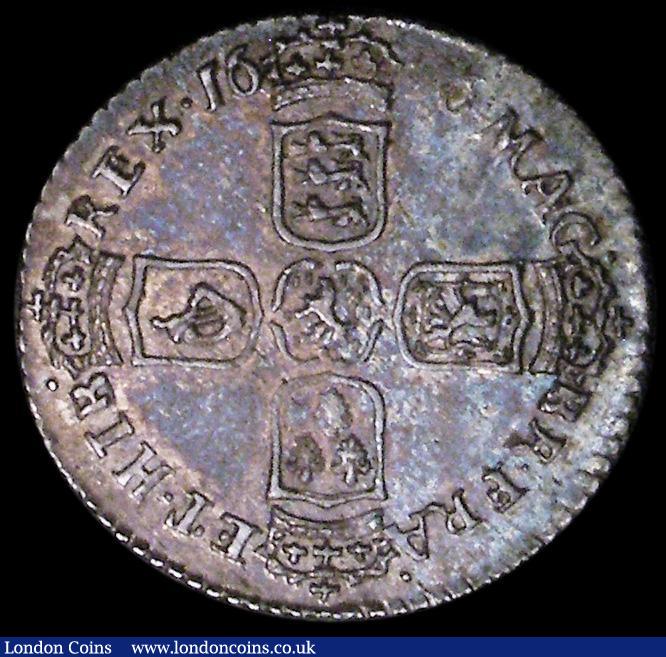 London Coins : A162 : Lot 1904 : Sixpence 1696 First Bust, Early Harp, Large Crowns ESC 1533, Bull 1202 NEF and attractively toned