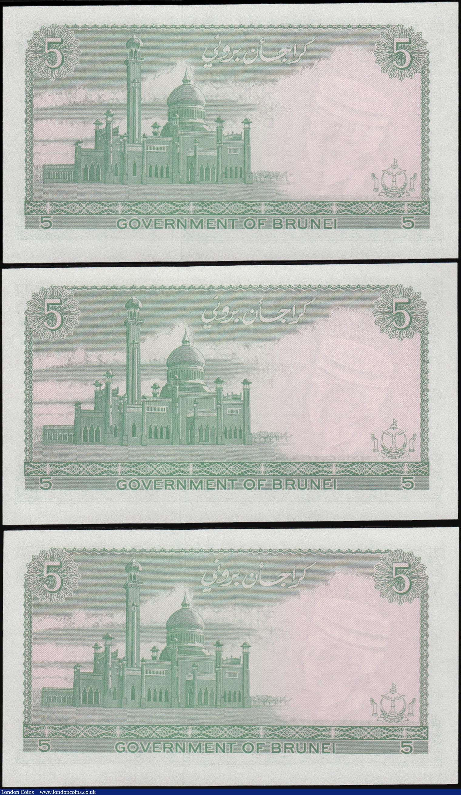 London Coins : A162 : Lot 219 : Brunei 5 Ringgit (3) dated 1967, a consecutively numbered run series A/2 984064 - A/2 984066, portra...