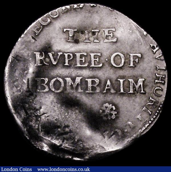 India - Bombay Presidency Pattern Rupee 1678 KM#Pn2, Pridmore 20, struck in silver at the Tower Mint, Obverse: THE RVPEE OF BOMBAIM in three lines, with two roses below, [BY] AUTHORITY OF [CHARLES THE] SECOND, Reverse: Crowned British Shield [KINGE. OF. GREAT. BRITAINE. ] FRANCE . AND. IREL [AND] 5.76 grammes, Fine on a wavy flan, struck off-centre, Very Rare. We refer to Pridmore Auction October 1982, Lots 450 and  451, this example with more similar striking and flan positioning to Lot 451, we also note a silver example in the British Museum  with larger roses, and weighing 10.83 grammes, only a handful of examples known in silver, we also note examples are known struck in pewter, a pewter example selling at Baldwins in 2009 for £10,552 inclusive of buyers premium : World Coins : Auction 162 : Lot 1211