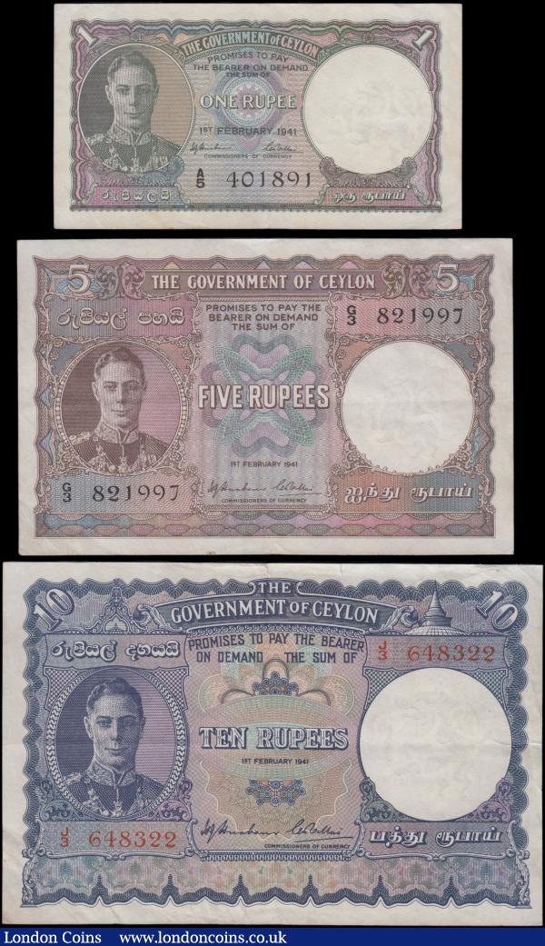 Ceylon Government (3), 10 Rupees dated 1st February 1941 series J/3 648322, (Pick33a) small edge tear to top border, one set of staple holes at left, about VF, 5 Rupees dated 1st February 1941 series G/3 821997 (Pick32) VF, 1 Rupee dated 1st February 1941 series A/5 401891, (Pick30) one set of staple holes at left, about VF, all with portrait King George VI at left : World Banknotes : Auction 163 : Lot 1413