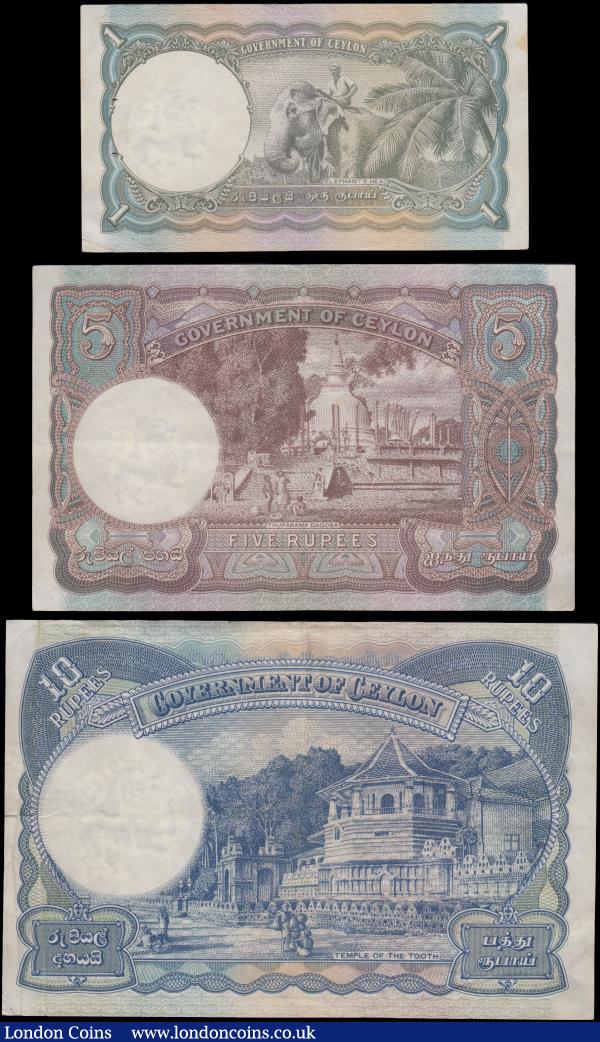 Ceylon Government (3), 10 Rupees dated 1st February 1941 series J/3 648322, (Pick33a) small edge tear to top border, one set of staple holes at left, about VF, 5 Rupees dated 1st February 1941 series G/3 821997 (Pick32) VF, 1 Rupee dated 1st February 1941 series A/5 401891, (Pick30) one set of staple holes at left, about VF, all with portrait King George VI at left : World Banknotes : Auction 163 : Lot 1413