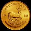 London Coins : A163 : Lot 2147 : South Africa Krugerrand 1980 KM#73 UNC or near so, lightly toning, with some small edge nicks