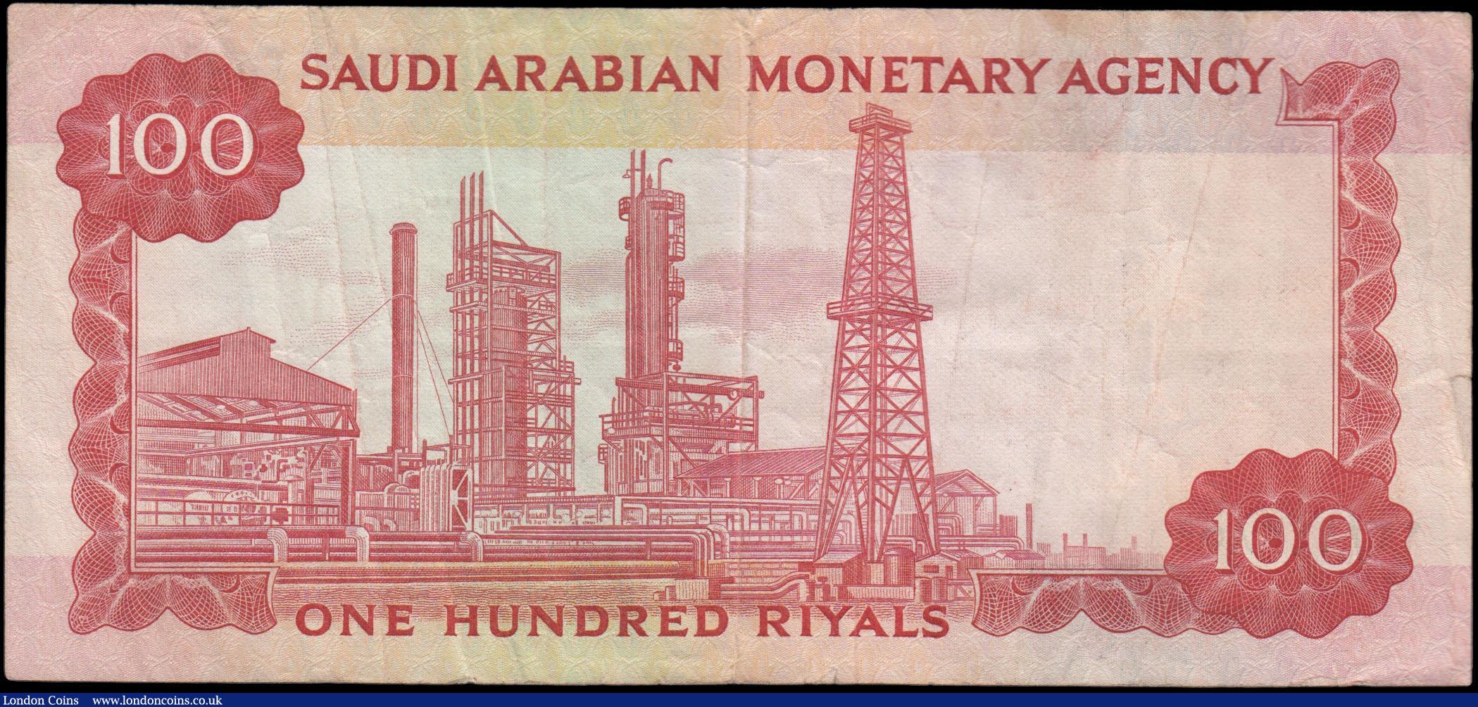 London Coins : A165 : Lot 1258 : Saudi Arabia 100 Riyals AH1379 Pick 15a signed Anwar Ali and Abdul Rahman approaching VF