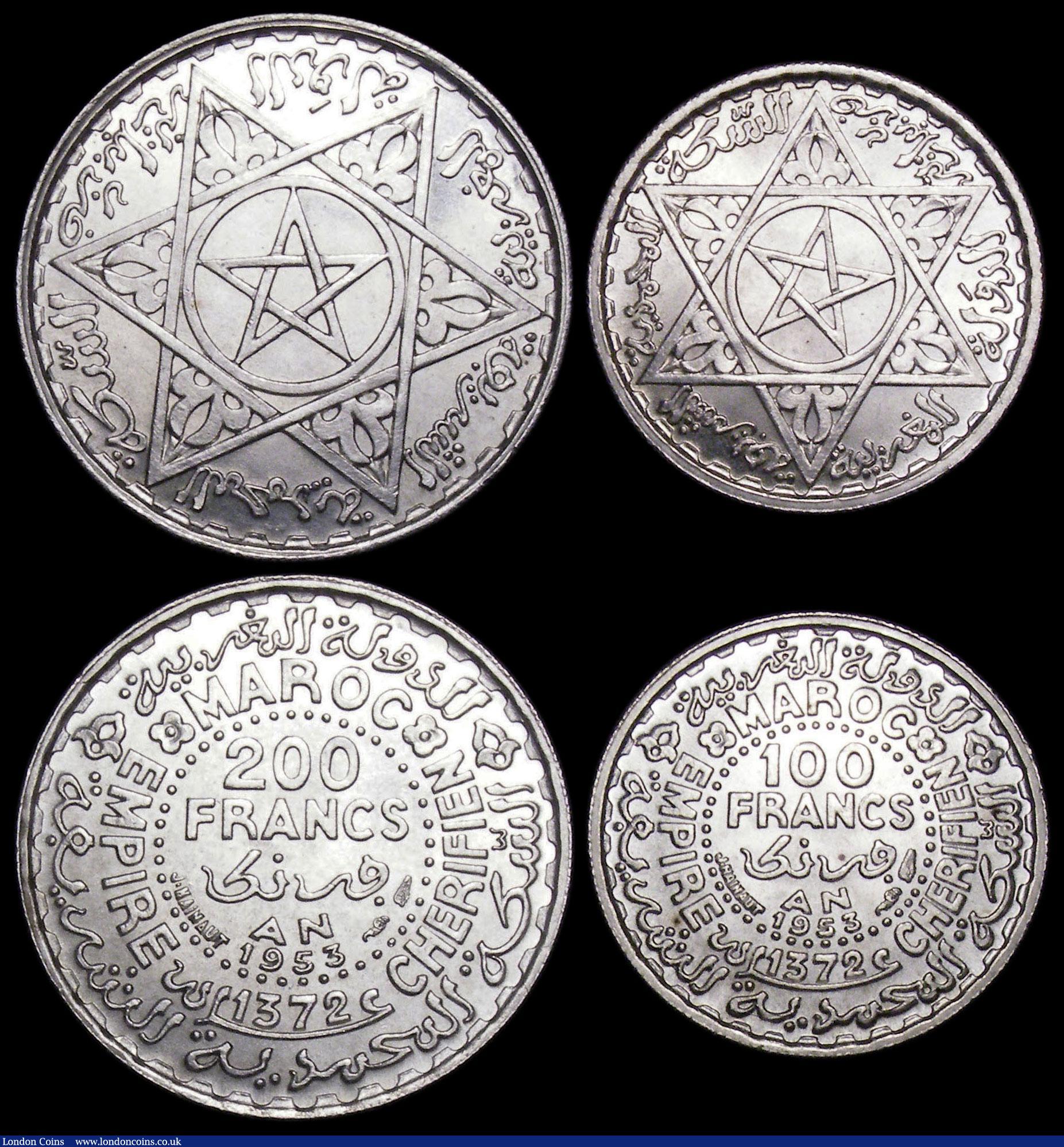 London Coins : A165 : Lot 3725 : Morocco (3) 500 Francs 1956 Y#54 Lustrous UNC, the reverse with a hint of golden tone, 200 Francs 19...