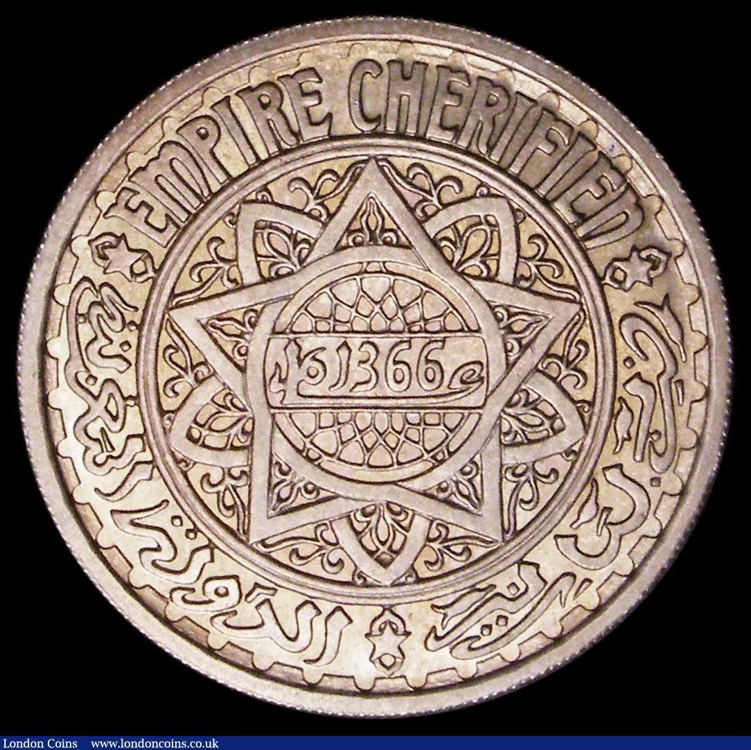 London Coins : A165 : Lot 3732 : Morocco 20 Francs AH1366 (1946) Essai in Cupro-Nickel KM#E36, type as Y#45 UNC and lustrous with gol...