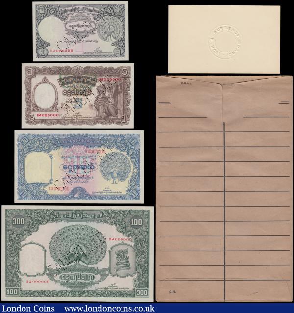 Burma Specimen Set ND 1953 Union Bank of Burma Act 1952 (4) comprising 1 Rupee looks like Pick 38 unlisted series 5J 000000 Peacock at right obverse & Sailing boat reverse. 5 Rupees looks like Pick 39 unlisted series IM 000000 Chinze at right obverse & Woman spinning wheel reverse. 10 Rupees looks like Pick 40 unlisted series 1X 000000 Peacock at right obverse & Man riding elephant lifting log reverse. 100 Rupees looks like Pick 41 unlisted series 5J 000000 Peacock at centre Chinze at right obverse & Farmer and oxen on reverse. All UNC and single tiny faint stain on each note these however not extending into design. Extremely Rare. With the passage of the Union Bank of Burma Act 1952, the sole right of currency issued was transferred from the Burma Currency Board to a newly created Currency Department of the Union Bank of Burma with effect from 1st July 1952. The Burma Currency Board was abolished and its asset and liabilities were transferred to the Union Bank of Burma. Another important change in the new currency is the conversion to a decimal system. When the Union Bank of Burma took over the central bank’s responsibilities, a token issue of the bank notes was made on 1st July 1952. The new bank notes had the rupee denominations (1,5,10,100 rupees) that was later connected to kyat. It included peacock water mark.  This set has been given to Mr. Sidney Wellington, Office of the High Commissioner for the United Kingdom who had been working with the UK & Burma Currency Board at the time and the set had stayed in possession of the family ever since. Comes with the contemporary brown envelope abbreviated at top left O.H.M.S (On His Majesty's Service) and the Royal Cypher G.R. of King George VI at bottom left along with a Burma Currency Board seal proof card. Part of a diplomat's group of Burma coins and notes which was  accompanied by the original Burma Currency Board Secretary's compliment slip and note to the original recipient Mr. Sidney Wellington, Office of the High Commissioner for the United Kingdom with this original documentation accompanying the Burma Proof Coin listed in the coin section : World Banknotes : Auction 165 : Lot 866