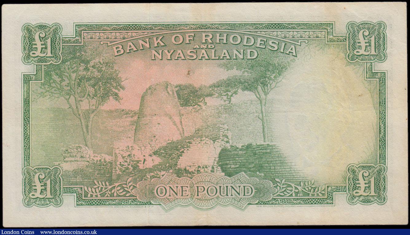 London Coins : A166 : Lot 386 : Rhodesia & Nyasaland Bank 1 Pound Pick 21a dated 11th June 1957 signed Grafftey-Smith serial num...