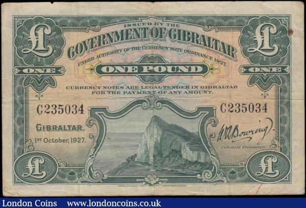 Gibraltar Government 1 Pound Pick 12 dated 1st October 1927 serial number C235034. The note in green on yellow-brown underprint with the obverse featuring the Rock of Gibraltar and the reverse displaying Coat of  Arms at centre. Presentable good Fine - about VF and the  very Scarce note earlier Waterlow & Sons Limited London Wall, London printing : World Banknotes : Auction 167 : Lot 1508