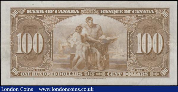 Canada Bank 100 Dollars Pick 64c dated Ottawa 2nd January 1937 serial number B/J 4869230 signatures Coyne & Towers. A Canadian Banknote Company Limited printing in black on brown underprint featuring portrait of Sir John A. Macdonald at centre on obverse. The reverse featuring allegorical figures. Very scarce higher denomination note sought after by many. Fresh and crisp GVF : World Banknotes : Auction 167 : Lot 1455