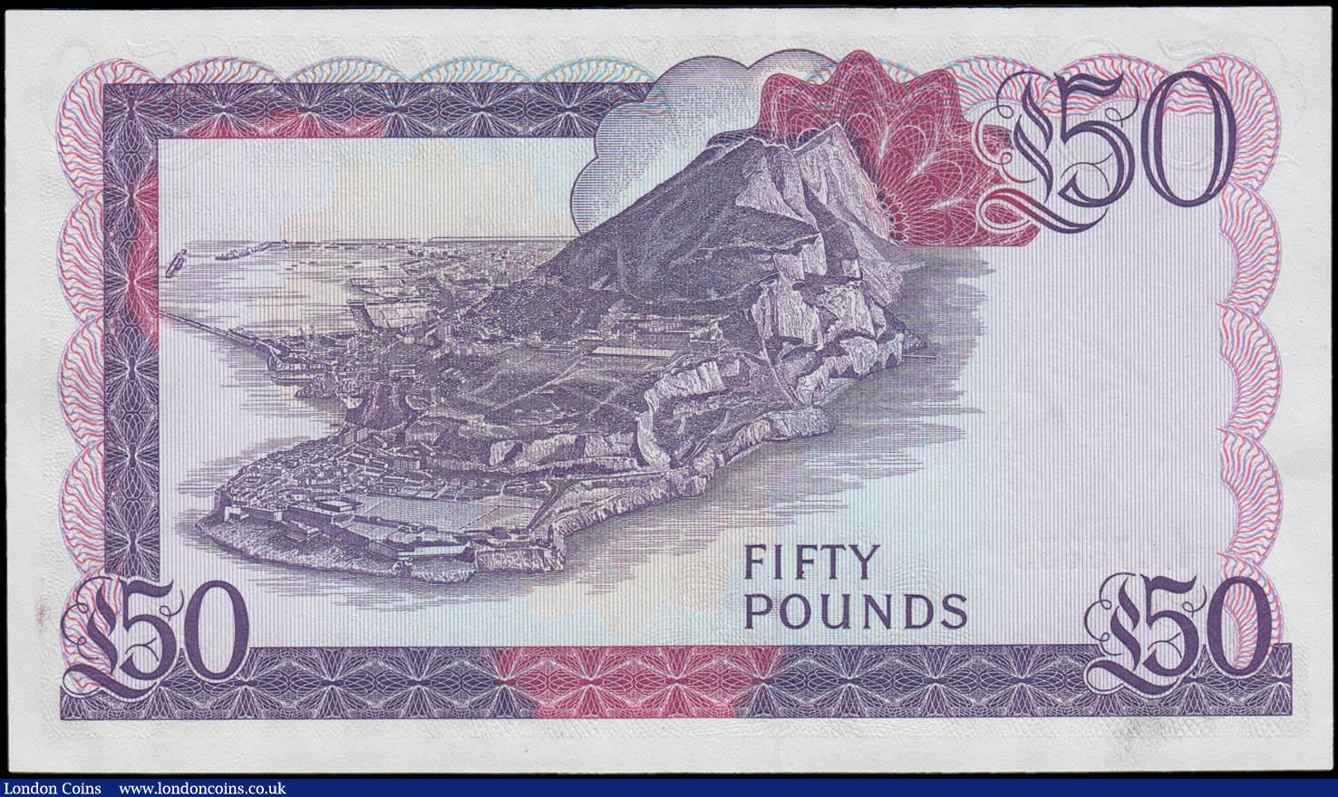 London Coins : A168 : Lot 191 : Gibraltar Government 50 Pounds Pick 24 dated 27th November 1986 serial number A 076638, fresh and cr...