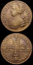 London Coins : A168 : Lot 1022 : Jettons (2) 1702 Queen Anne, reverse four shields in cruciform 23.5mm diameter in brass? GVF, 1761 Q...