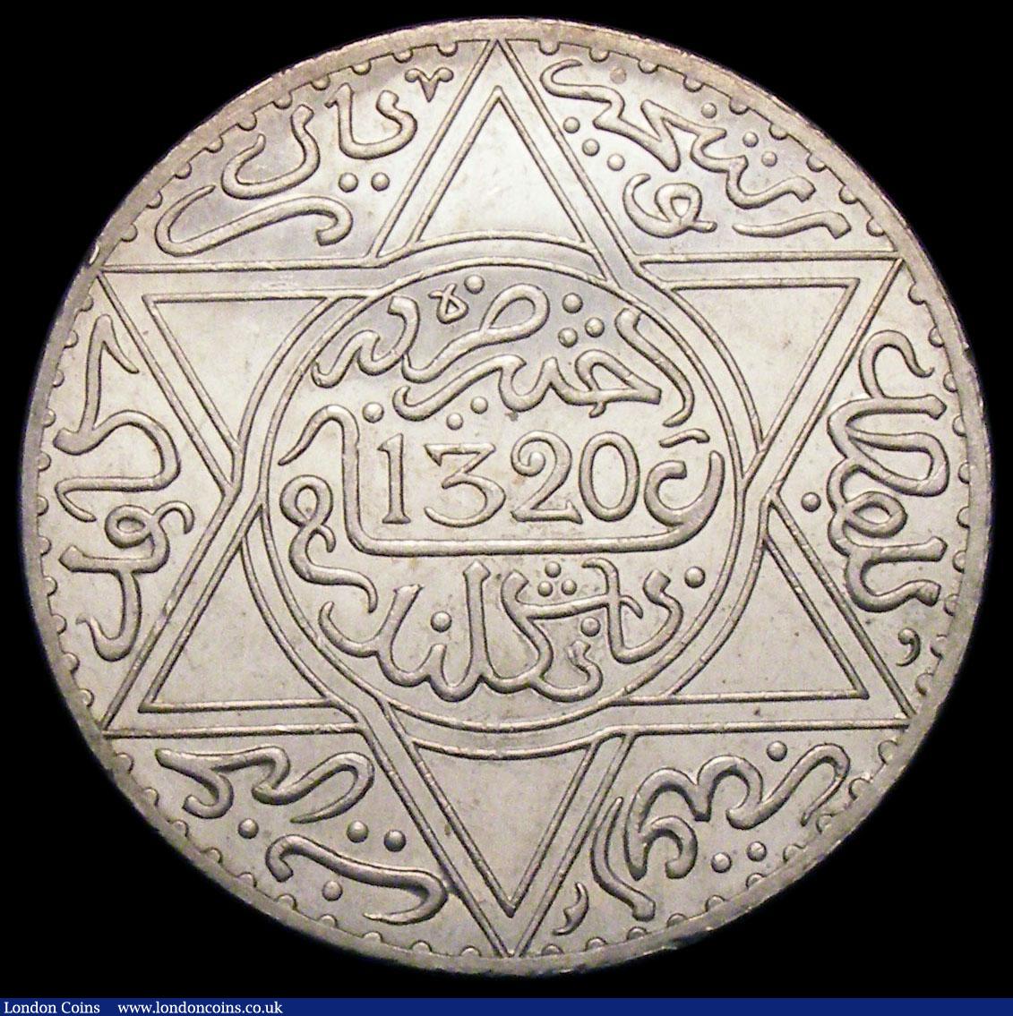 London Coins : A169 : Lot 1025 : Morocco 5 Dirhams AH1320 London Mint Y#22.1 UNC or near so and lustrous the obverse with small spots