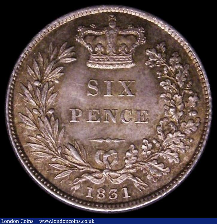 London Coins : A169 : Lot 1804 : Sixpence 1831 ESC 1670, Bull 2499 lustrous with choice golden tone in the legends, in an LCGS holder...