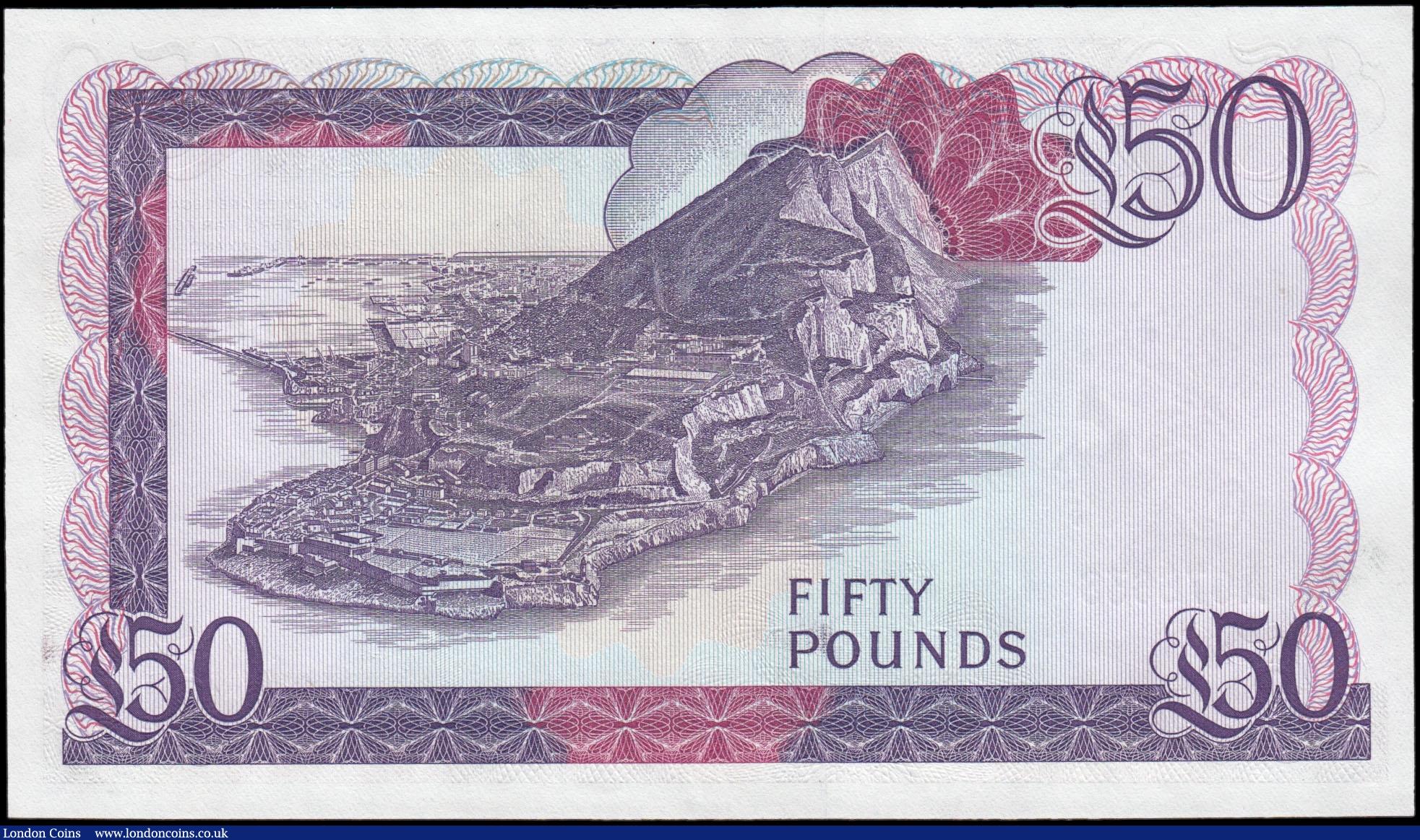 London Coins : A169 : Lot 186 : Gibraltar Government 50 Pounds Pick 24 dated 27th November 1986 serial number A 076636, fresh and cr...