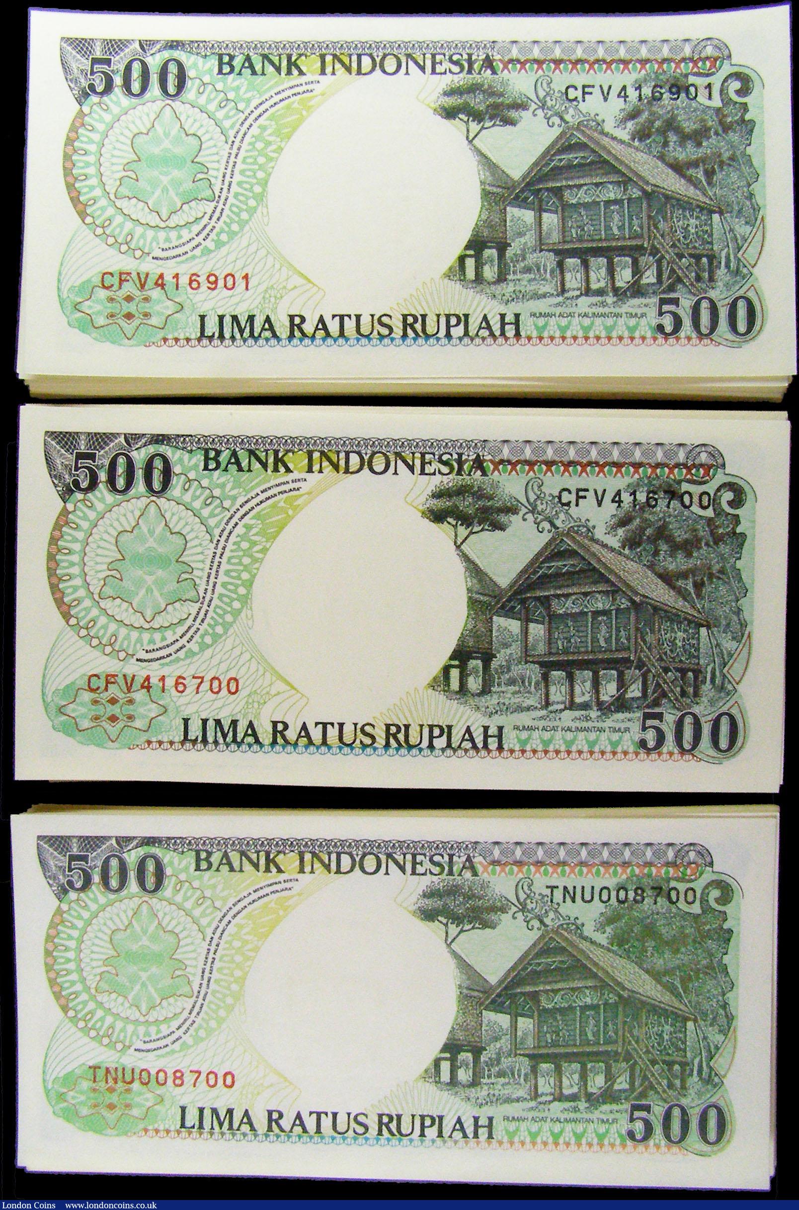 London Coins : A169 : Lot 198 : Indonesia Bank 500 Rupiahs 1992 -1999 (300) in 3 consecutively numbered bundles of 100 notes each. T...