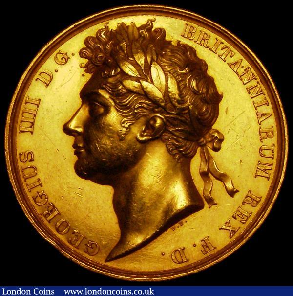 Coronation of George IV 1821 35mm diameter in gold an unfinished pattern of the Official Royal Mint issue by B.Pistrucci (Eimer 1146a), of similar style design. Obverse: Bust Left Laureate, GEORGIUS IIII D.G. BRITANNIARUM REX F.D. Reverse: George IV enthroned, left, crowned by Victory, behind, before him stand Britannia, Hibernia and Scotia PROPRIO JAM JURE. ANIMO PATERNO, the pattern however with differing reverse exergue legend thus: INAUGURATUS/ DIE.       /ANNO MDCCC in three lines. The B.P initials on the right of the exergual line have the following stop approximately 0.75mm from it's extreme right edge, whereas on the standard Royal Mint issue the stop following the initials is around 1.5mm from the extreme right edge. Weight 33.00 grammes. GVF with some contact marks and edge nicks. We note an example of this rare pattern exists in the Metropolitan Museum of Art. Fifth Avenue, New York. Our research has only uncovered the Metropolitan Museum example as well as the medal offered. See also the Gold Coronation of George IV Official Royal Mint issue 1821 medal also offered in this sale : Medals : Auction 169 : Lot 334