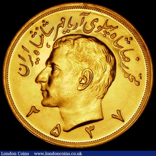 Iran Gold 10 Pahlavi MS2537 (1978) KM#1213, 81.36 grammes of .900 gold, Obverse: Head of the Shah, left with 'Aryamehr' now added to the legend, Reverse: Crown above radiant lion holding sword within wreath, BU and fully lustrous, an imposing coin, the flagship coin of the Iranian series and the last large Gold issue bearing the portrait of the Shah, these pieces were used as presentation pieces by the Shah to friends and dignitaries. This piece would be a high quality addition to any World or Middle Eastern Collection : World Coins : Auction 169 : Lot 980