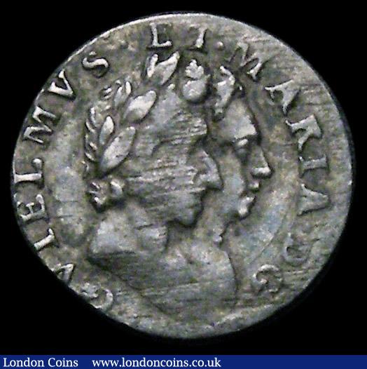 Maundy Penny 1689 GVIELMVS error legend on the obverse, LT for ET error on the reverse ESC 2299, no Bull equivalent, VF toned the date off-flan as with many Maundy Pennies of this date, with some adjustment lines, in an LCGS holder and graded LCGS 40, a very rare piece, these are always keenly sought after on the rare occasions they are offered,  Ex-Harrington Manville collection : English Coins : Auction 170 : Lot 1885