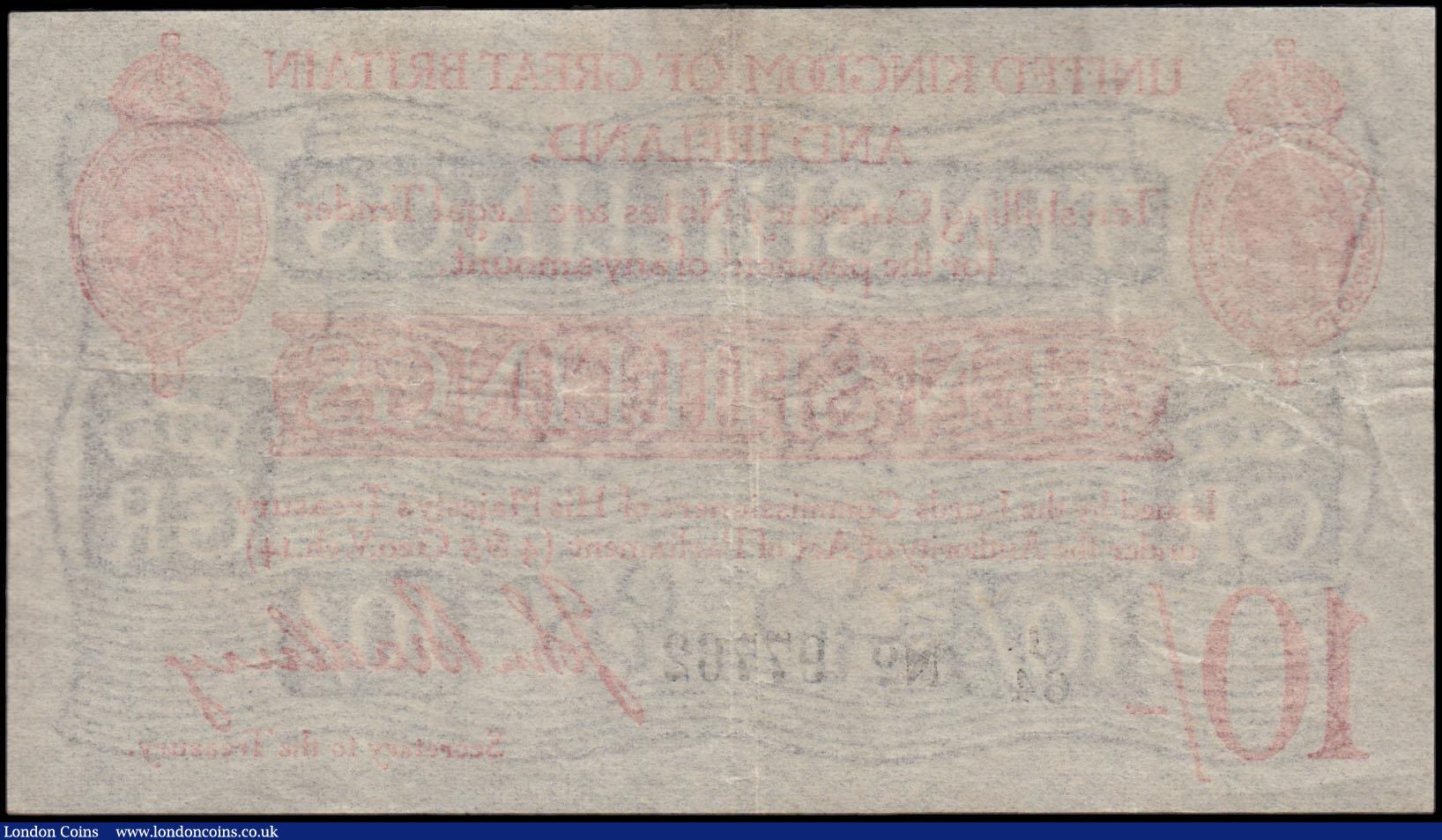 London Coins : A170 : Lot 22 : Ten Shillings Bradbury Second issue T12.1 De La Rue Red Five digit serial prefix Letter only issue 1...