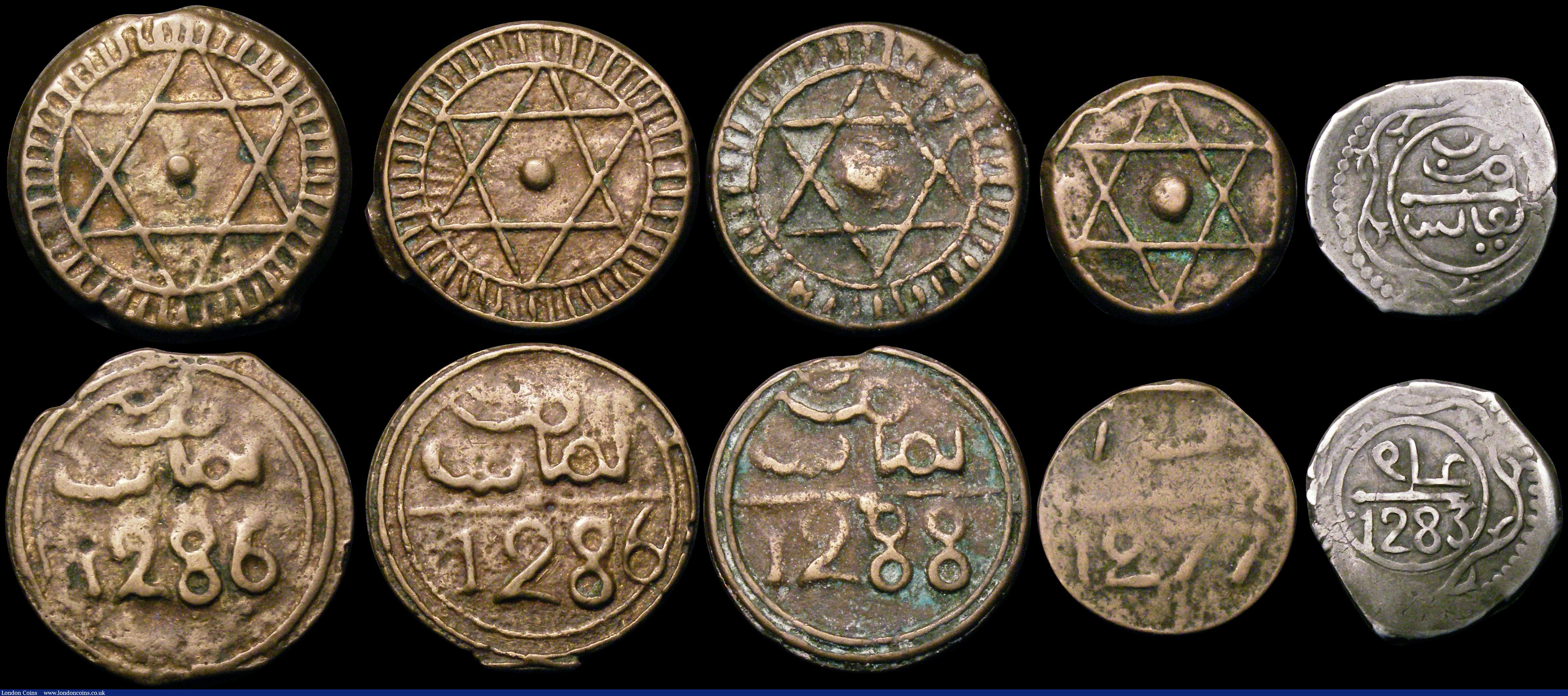 London Coins : A170 : Lot 2635 : Morocco hammered coinage (12) 4 Falus (9) AH1283, AH1284, AH1286 (2), AH1287 7 over 6, AH1288 (2), A...