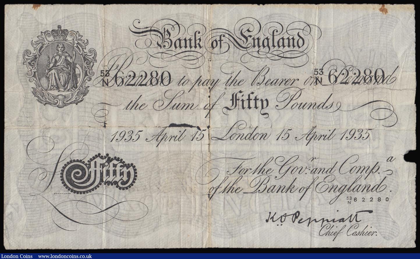 London Coins : A172 : Lot 22 : Fifty pounds Peppiatt white B244 dated 15th April 1935 series 53/N 62280 VG many folds and some hole...