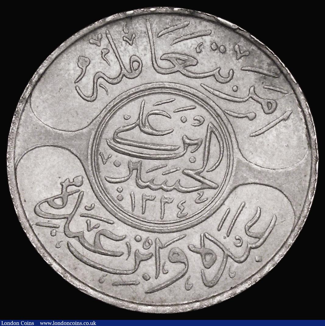 London Coins : A173 : Lot 1382 : Hejaz 20 Piastres (Riyal) AH1334/8 KM#30 EF or near so with some light surface residue, this possibl...